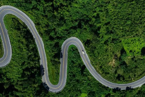 Bendy road in nature - listing tile