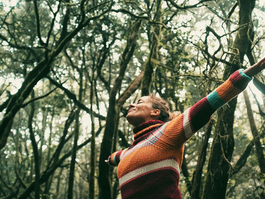 A lady outside in nature
