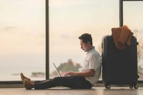 Working traveller with a suitcase